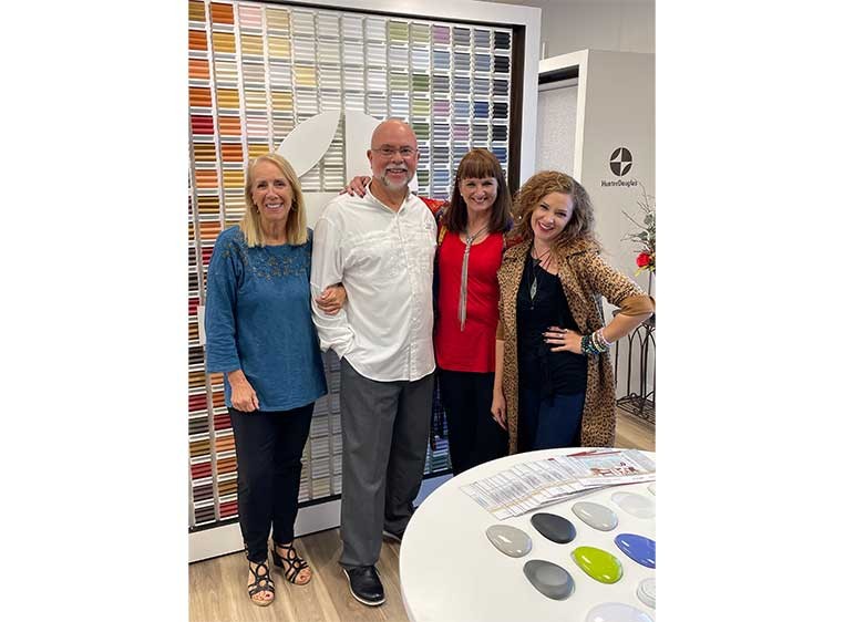 The owner and her team.